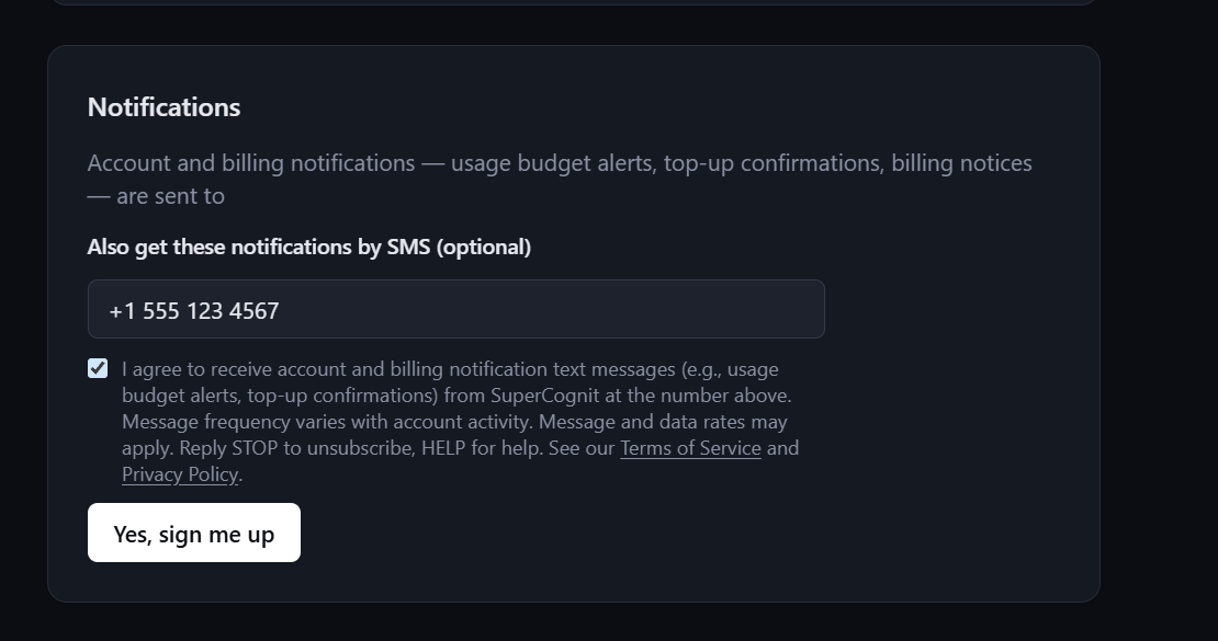 The same card with the SMS consent checkbox actively ticked by the user and the sign-up button now enabled.